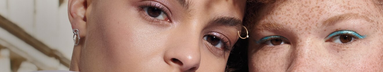 Maybelline Face Makeup products illustrative banner image - Close up of two blond models 